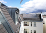 Blick auf Gauben und Terrasse zum Hof